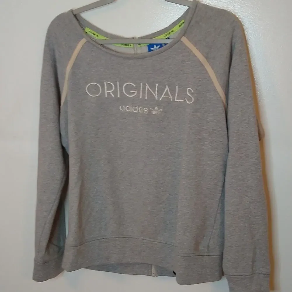 Original Adidas Women's size medium sweatshirt. Comfy and Cozy